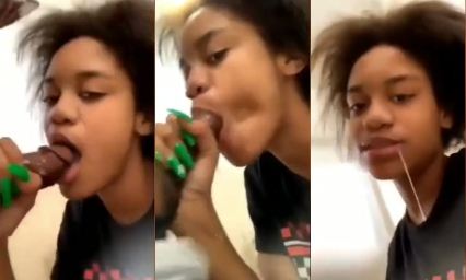 Horny black teen sucking a dick